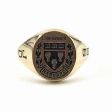 Harvard law school class ring with university crest