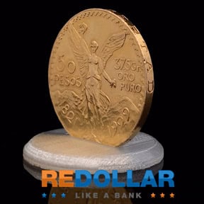 The statement "INDEPENDENCIA Y LIBERTAD" is visible on the coin's rim.
