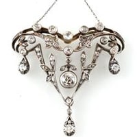 Art Nouveau white gold pendant with diamonds