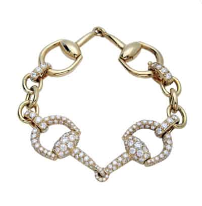 Gucci Horsebit bracelet in 18K gold with diamonds
