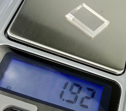 weighing a Bulova watch crystal on digital scale