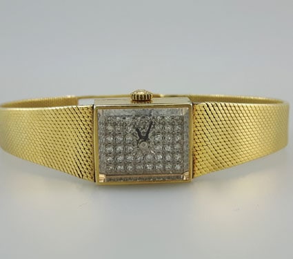vintage Bulova diamond dial watch in 14k slid yellow gold