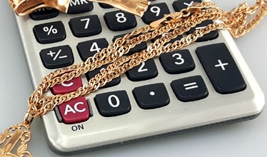 use a calculator to evaluate the selling value of your gold necklace