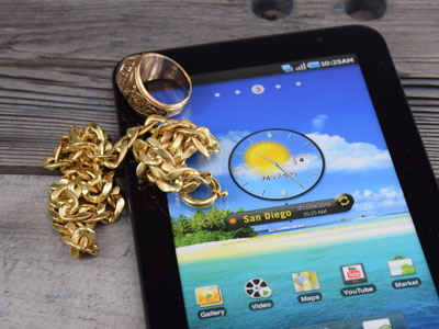 Tablet used to start cash for gold transaction