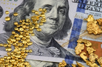 Natural Gold Nuggets & Granules on 100 US dollar bills
