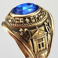 Central Catholic High School class ring with religious symbols