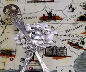 pure silver and silver spoons on US civil war map
