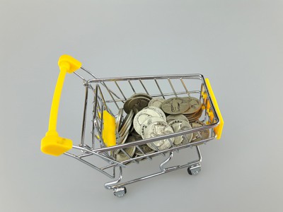 stock image: buy silver quarters, quarter coins in shopping cart