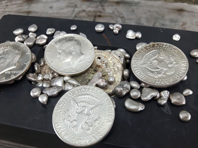 stock image: melt US silver coins, silver coin melt value