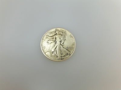 stock image: Walking Liberty silver coin close-up, 1944, obverse