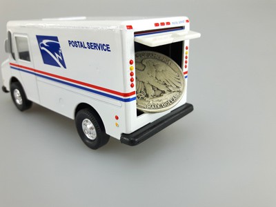 stock image: USPS truck delivering silver half dollar coin