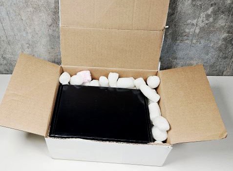 The inner box, containing the Silver Dollars, will be placed in an outer shipping box.