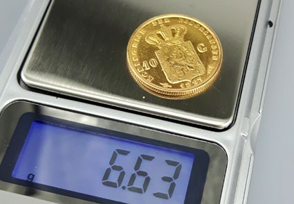 weighing a faked 10 Guilders gold coin: 6.63 grams