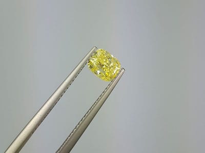 stock image: loose fancy yellow and GIA graded diamond