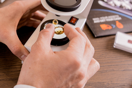 redollar gemstone expert checking citrine