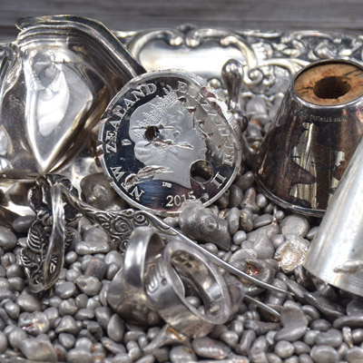 scrap silver mixture contains coin, jewelry, tray, mug and cutlery