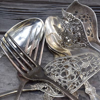 silver forks, spoons and cake lifter