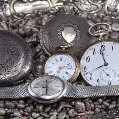 silver pocket watches and wristwatch