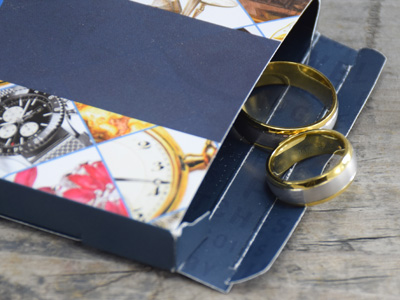 wedding rings in selling box about to ship