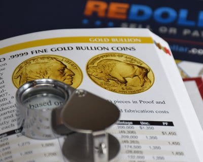 reDollar research for buffalo gold coins with literature an magnifier