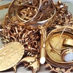 gold jewelry mixture lot containing rings, coins, chains
