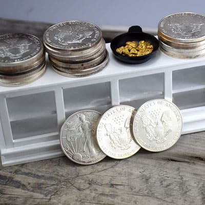 Value comparison between natural gold nuggets and silver Eagle coins