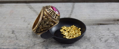 Gold class ring with pure gold granules
