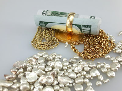 stock image: silver nuggets, Krugerrand, ring, dollars