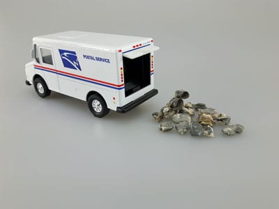 stock image: dental gold, USPS truck, buy and sell online