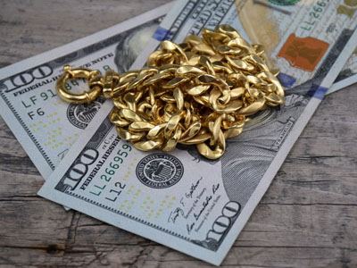 stock image: gold necklace, dollars, jewelry, cash