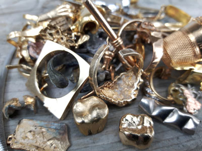 stock images: scrap gold, damaged rings, gold crowns, melted gold, broken gold