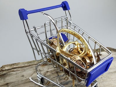 stock image: shopping cart, gold shopping, jewelry shopping