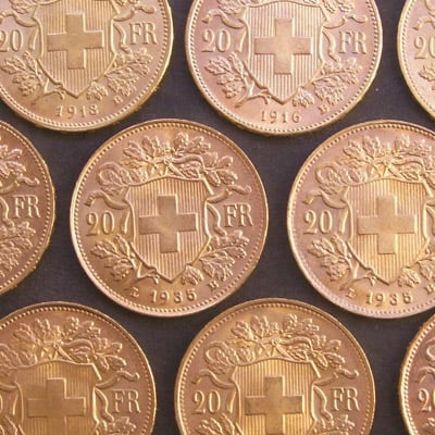 9 Swiss 20 Francs gold coins various years
