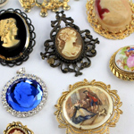 brooches made of 14 karat gold, 18 karat gold and sterling silver