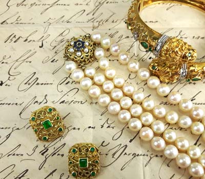 will - old letter and gold jewelry