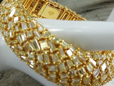 stock image: yellow gold diamond bracelet