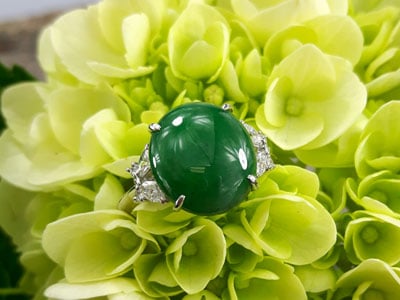 stock image: green jadeite and diamonds white gold ring