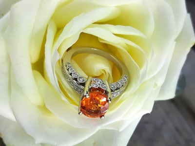 stock image: mandarin spessartite designer ring in white gold