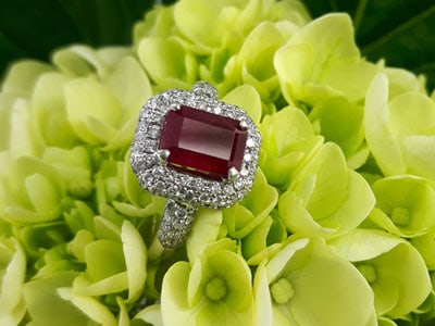 stock image: ruby and diamond ring in white gold ring setting