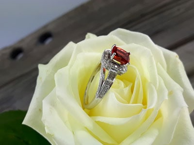 stock image: orange spinel, white gold diamond designer ring