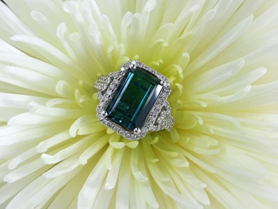stock image: blue tourmaline and diamond loaded gold ring