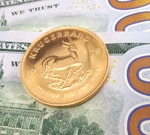 Krugerrand coin ready for selling on dollar bill