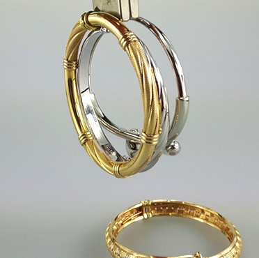 testing gold bangles with a magnet