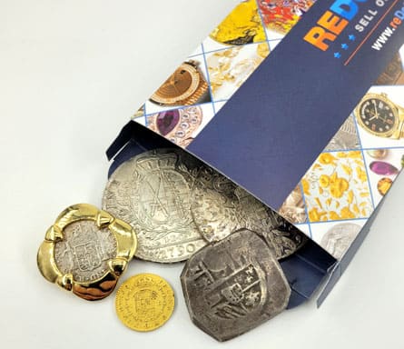 Antique coins, silver coins, and a gold coin