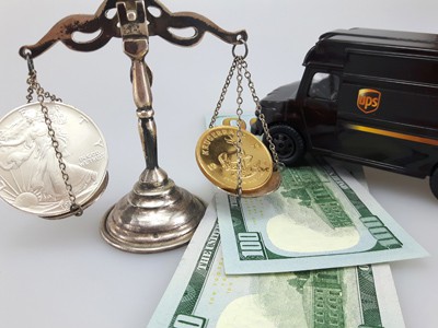 stock image: US dollars, cash, scale, shipping truck, gold coin