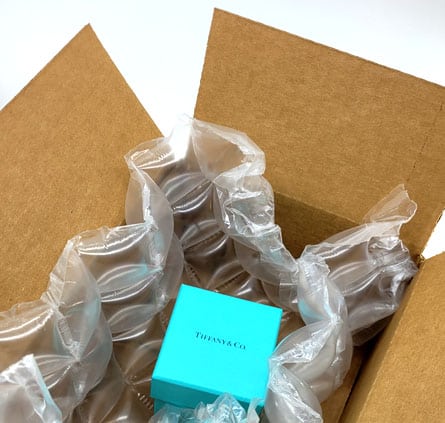 Well-packed Tiffany ring in reDollar shipping box