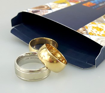 gold rings packed in a shipping box