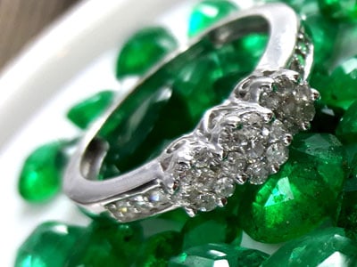 Palladium Diamond engagement ring on emeralds