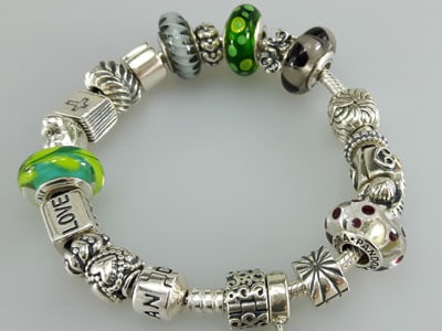 stock image: green, grey and black Pandora bracelet