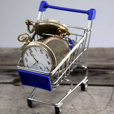 silver pocket watches and Omega watch in shopping cart
